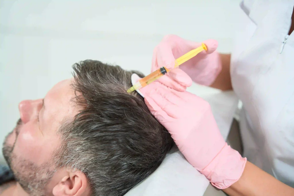 Man receives hair treatment at medical spa 2026 03 10 02 10 37 utc